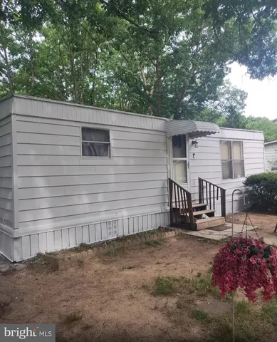 a view of backyard of house