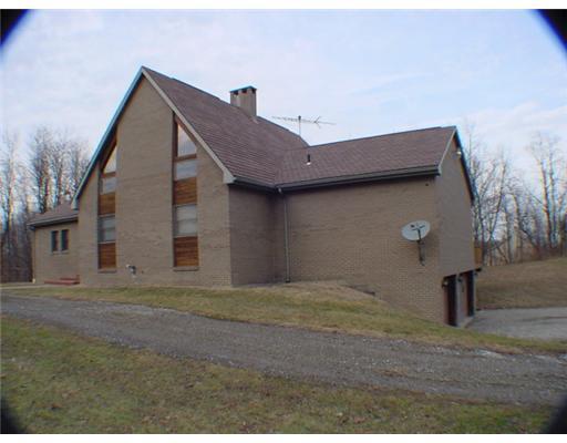 3 Ridgeview Lane Clinton, PA 15026 - Photo 1 of 18 Exterior Front. Large custom ranch home with center loft on 2.9 acres in the Ridgeview Acres community. 3 car garage.
