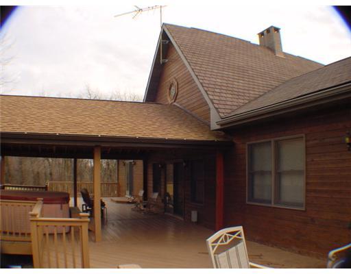 3 Ridgeview Lane Clinton, PA 15026 - Photo 16 of 18 Patio/Deck. 2 Decks with a Covered Porch in between. Cedar siding on back of home. Deck overlooks large level lawn.