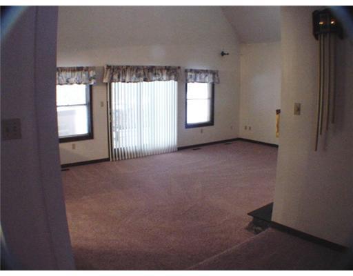 3 Ridgeview Lane Clinton, PA 15026 - Photo 3 of 18 Living Room. Vaulted and Sunken Living room showing sliding doors to the enormous deck. Stone fireplace is on opposite wall.