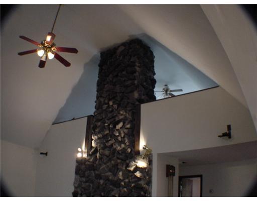 3 Ridgeview Lane Clinton, PA 15026 - Photo 5 of 18 Living Room. Stone log burning fireplace in Living Room extends to the loft.