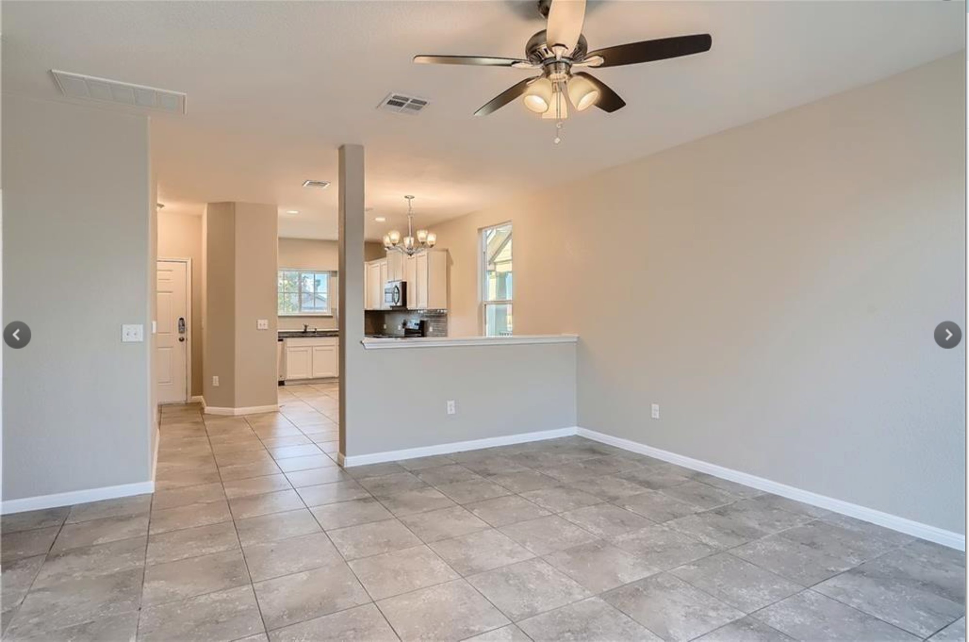 304 Cane River Road Pflugerville, TX 78660 - Photo 31 of 31 An open floorplan features a seamless transition from the main living area to the kitchen.