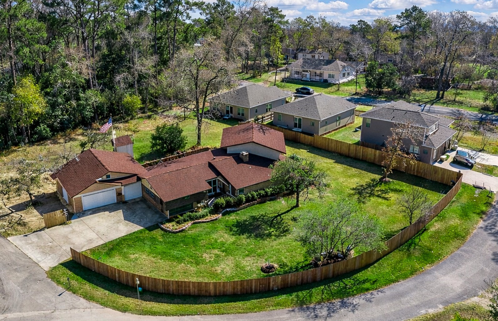 an aerial view of a house with garden