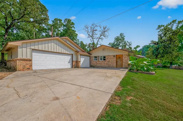 a front view of house with yard