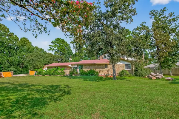 a view of a house with a big yard