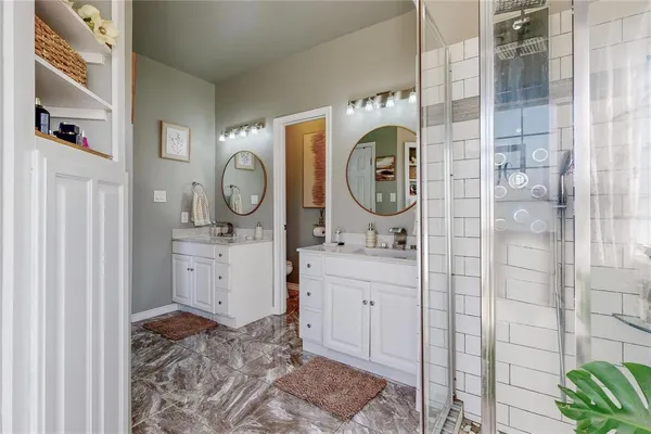 a room with dryer and chandelier
