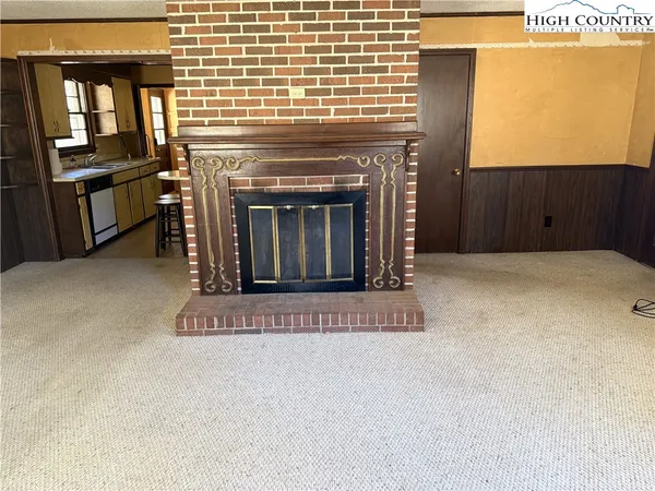 a living room with a fireplace