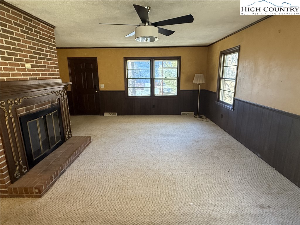288 Sussex Road Grassy Creek, NC 28631 - Photo 5 of 22 a view of an empty room with a window