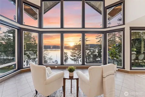 a living room with large windows