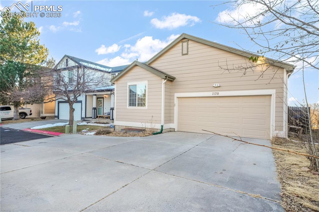 7170 Leeside View Colorado Springs, CO 80922 - Photo 1 of 50 a view of a house with a street