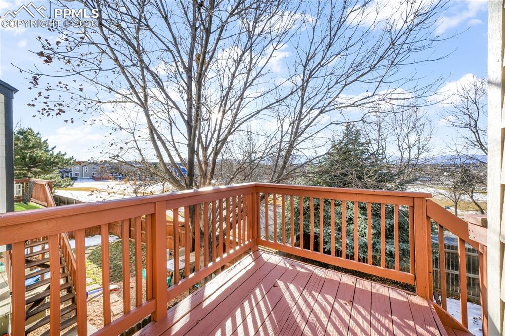 7170 Leeside View Colorado Springs, CO 80922 - Photo 13 of 50 a view of a wooden deck