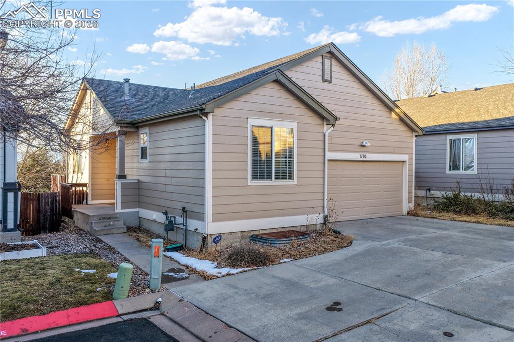 7170 Leeside View Colorado Springs, CO 80922 - Photo 6 of 50 a view of a house with backyard