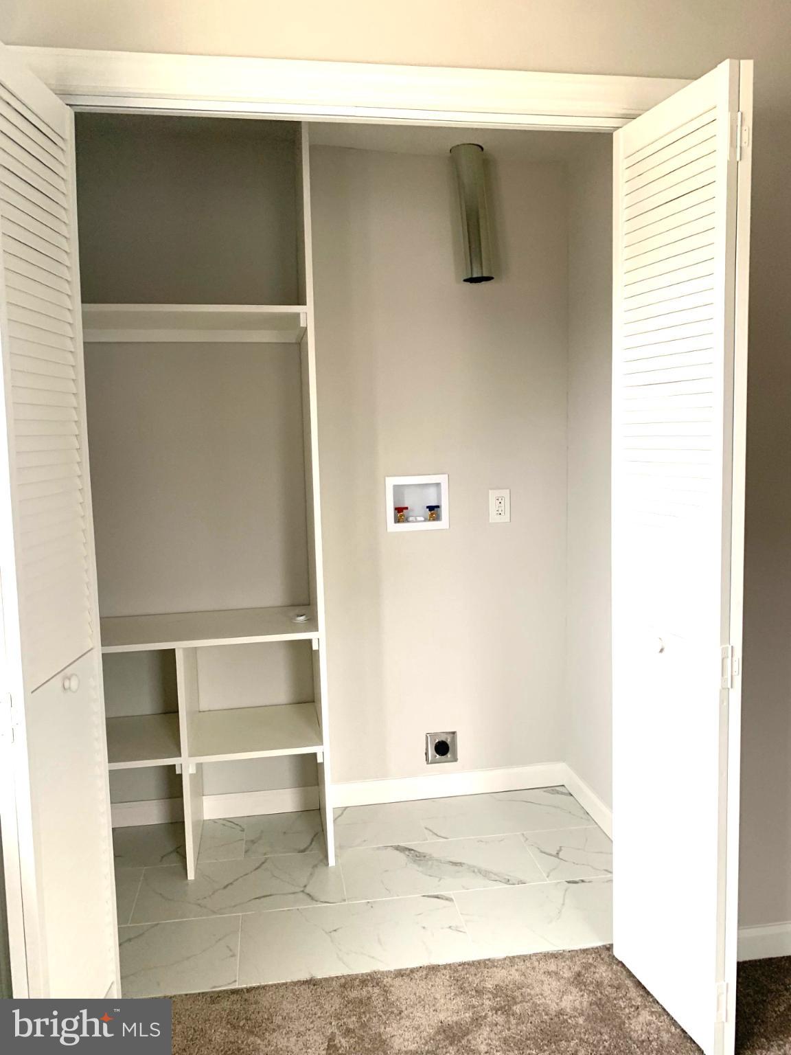 804 South Fairview Street Riverside, NJ 08075 - Photo 11 of 19 a view of walk in closet with empty racks