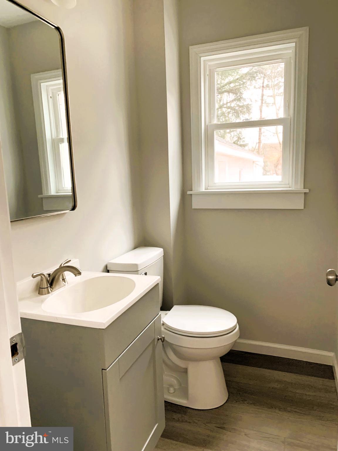804 South Fairview Street Riverside, NJ 08075 - Photo 9 of 19 a bathroom with a sink and a toilet