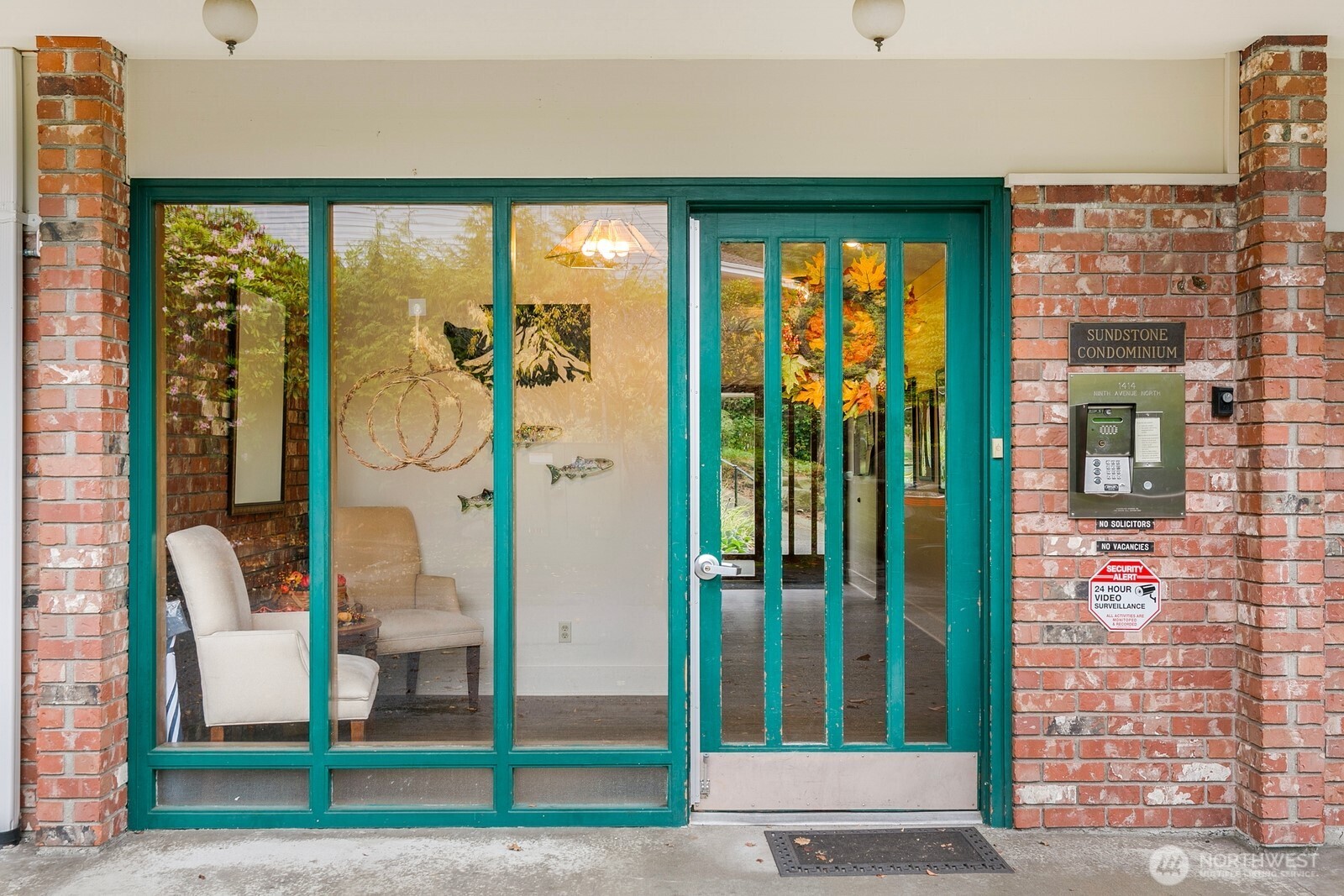 1414 9th Avenue North, Unit 105 Edmonds, WA 98020 - Photo 24 of 35 a view of a glass door of the house