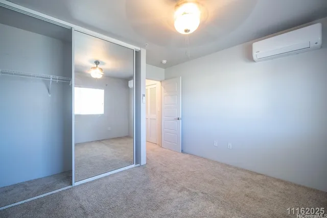 an empty room with a bathroom