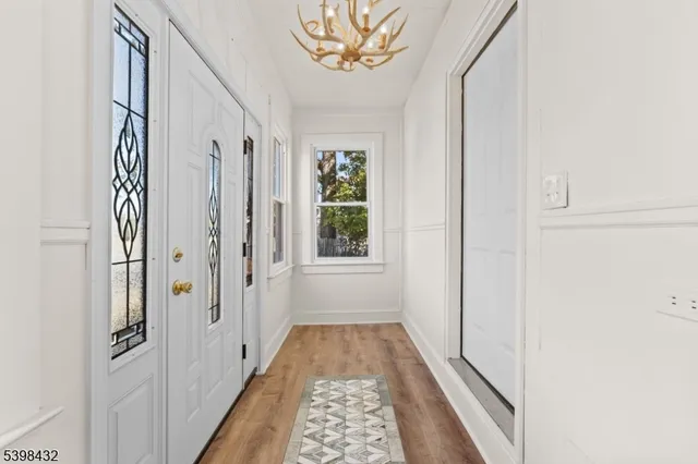 a view of a hallway with windows
