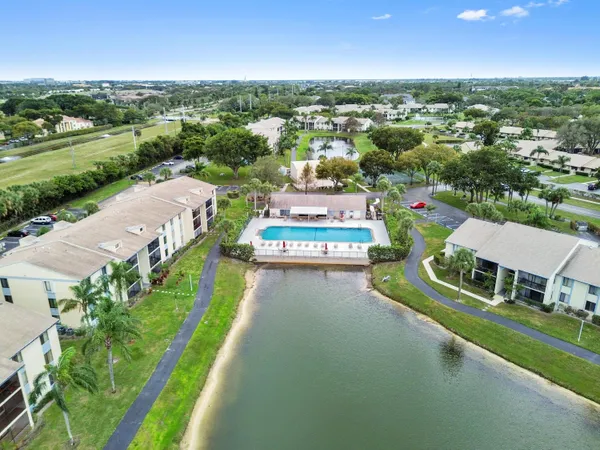 an aerial view of a house with a garden