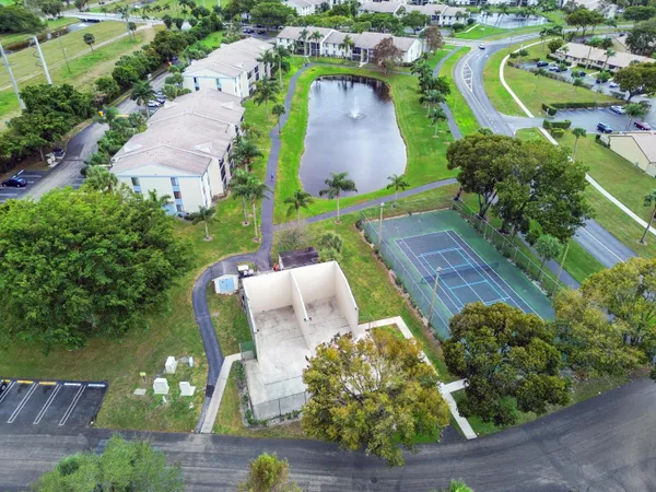 an aerial view of a house with outdoor space