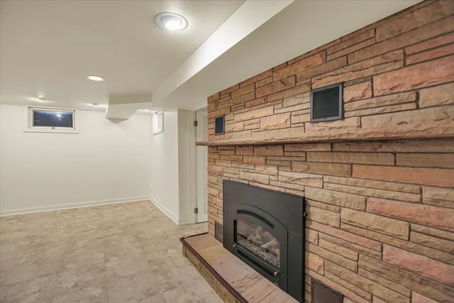 a stove top oven sitting inside of a kitchen