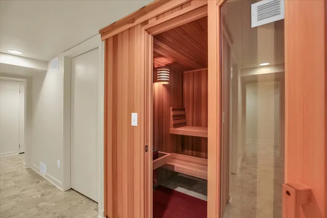 a view of a bathroom from a hallway