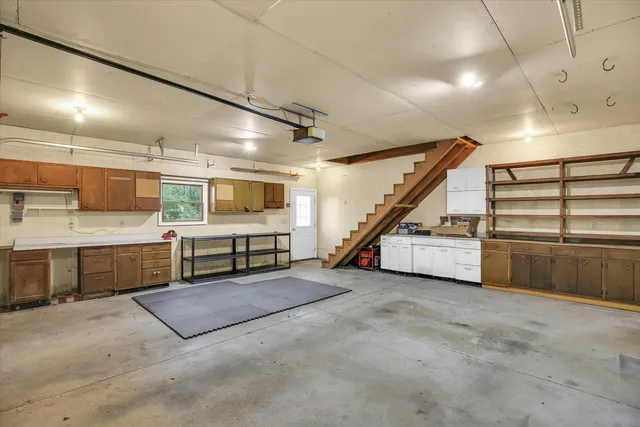 a view of a hallway with seating area