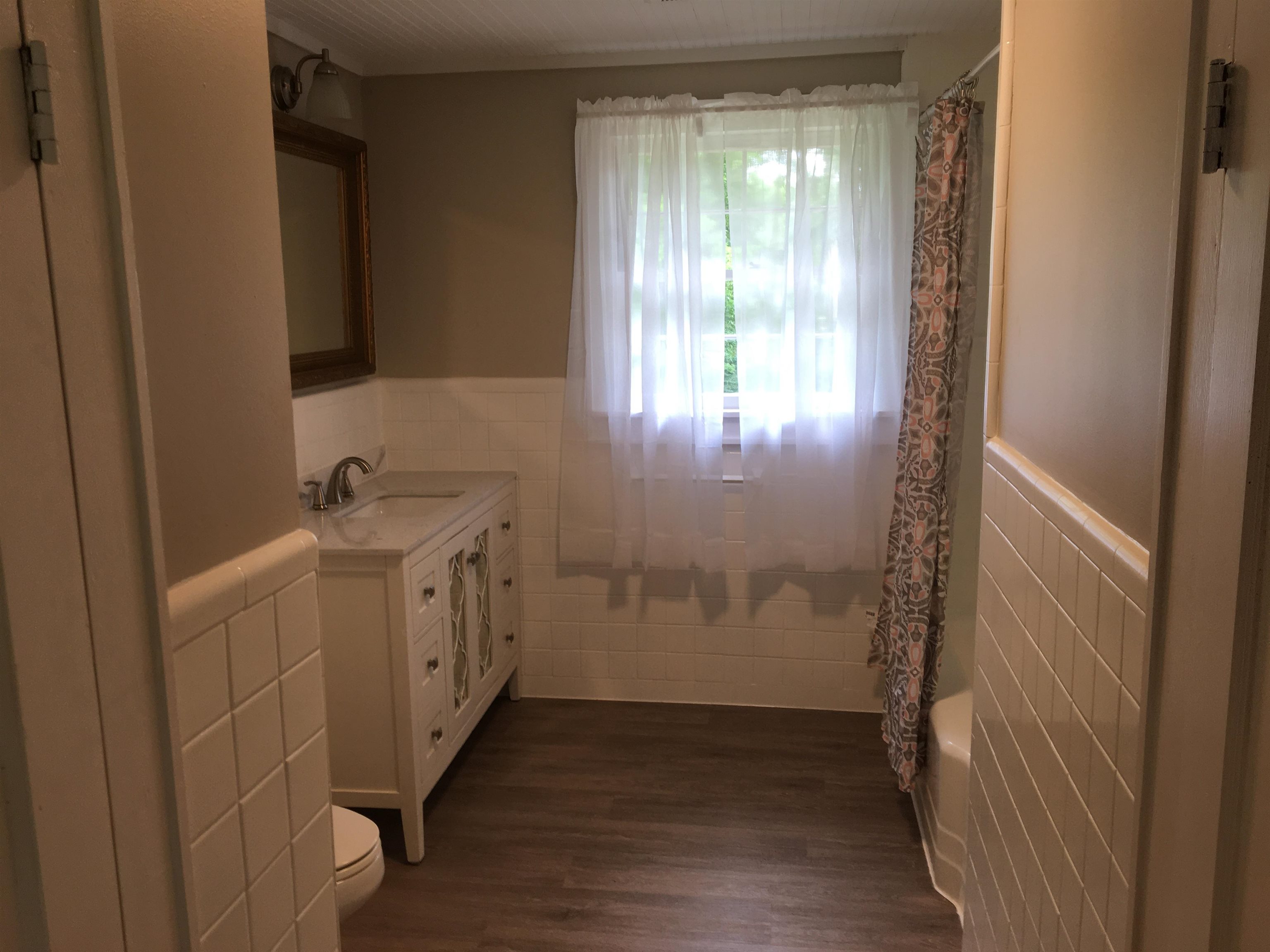 855 Highway 22 Shiloh, TN 38376 - Photo 17 of 24 a bathroom with a sink and a mirror