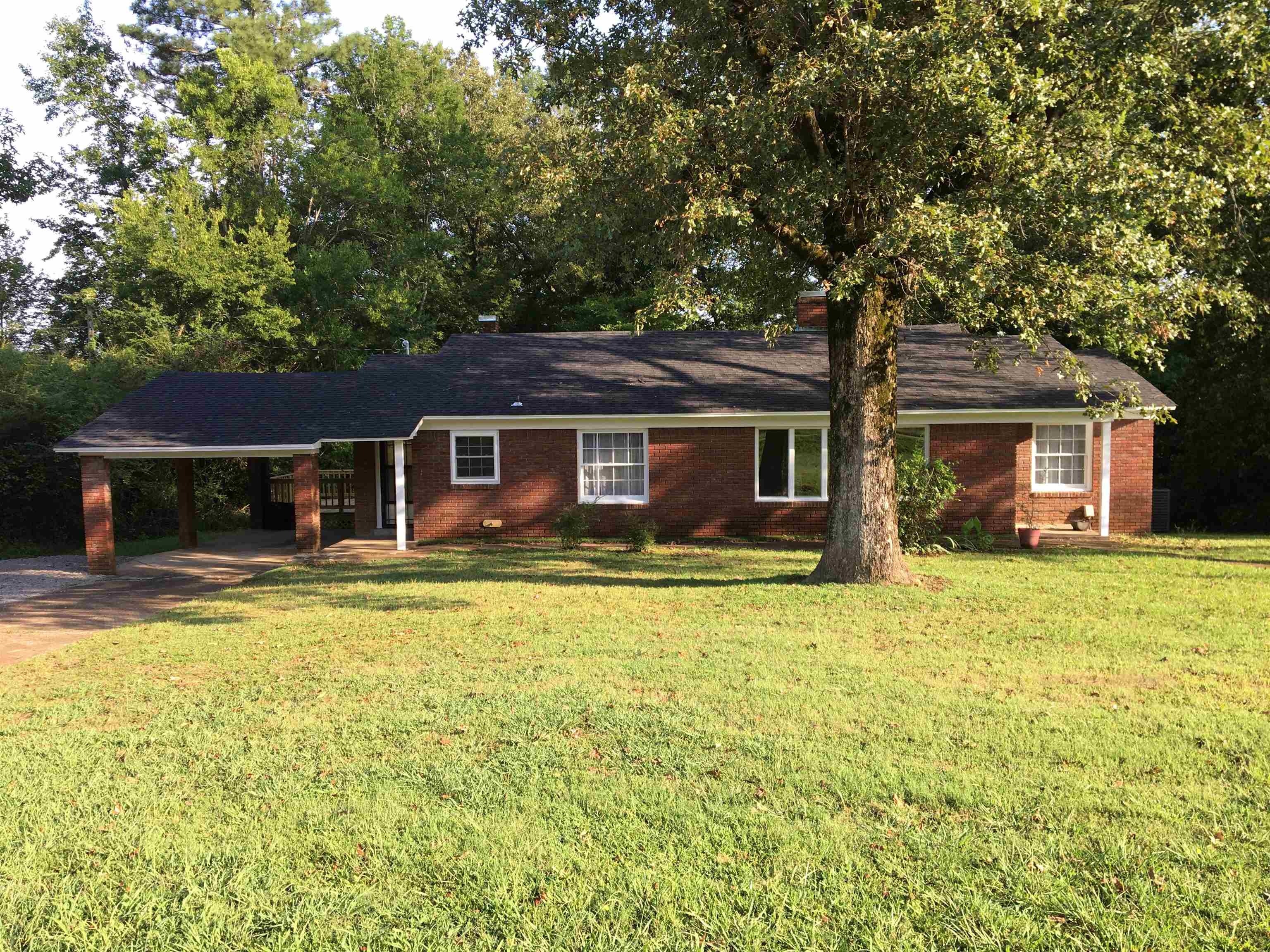 855 Highway 22 Shiloh, TN 38376 - Photo 2 of 24 a front view of a house with a garden
