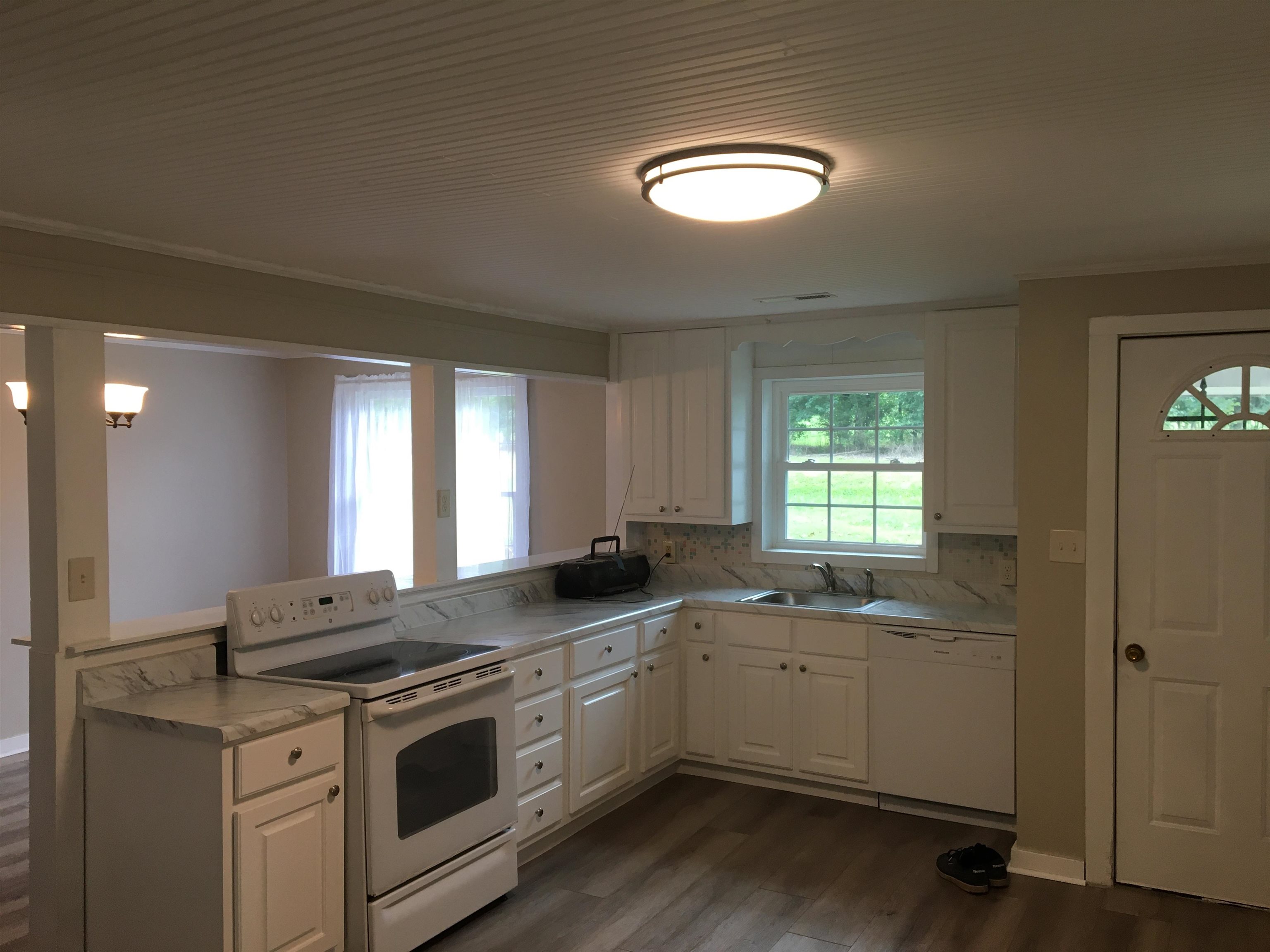 855 Highway 22 Shiloh, TN 38376 - Photo 6 of 24 a view of a kitchen counter sink and stove