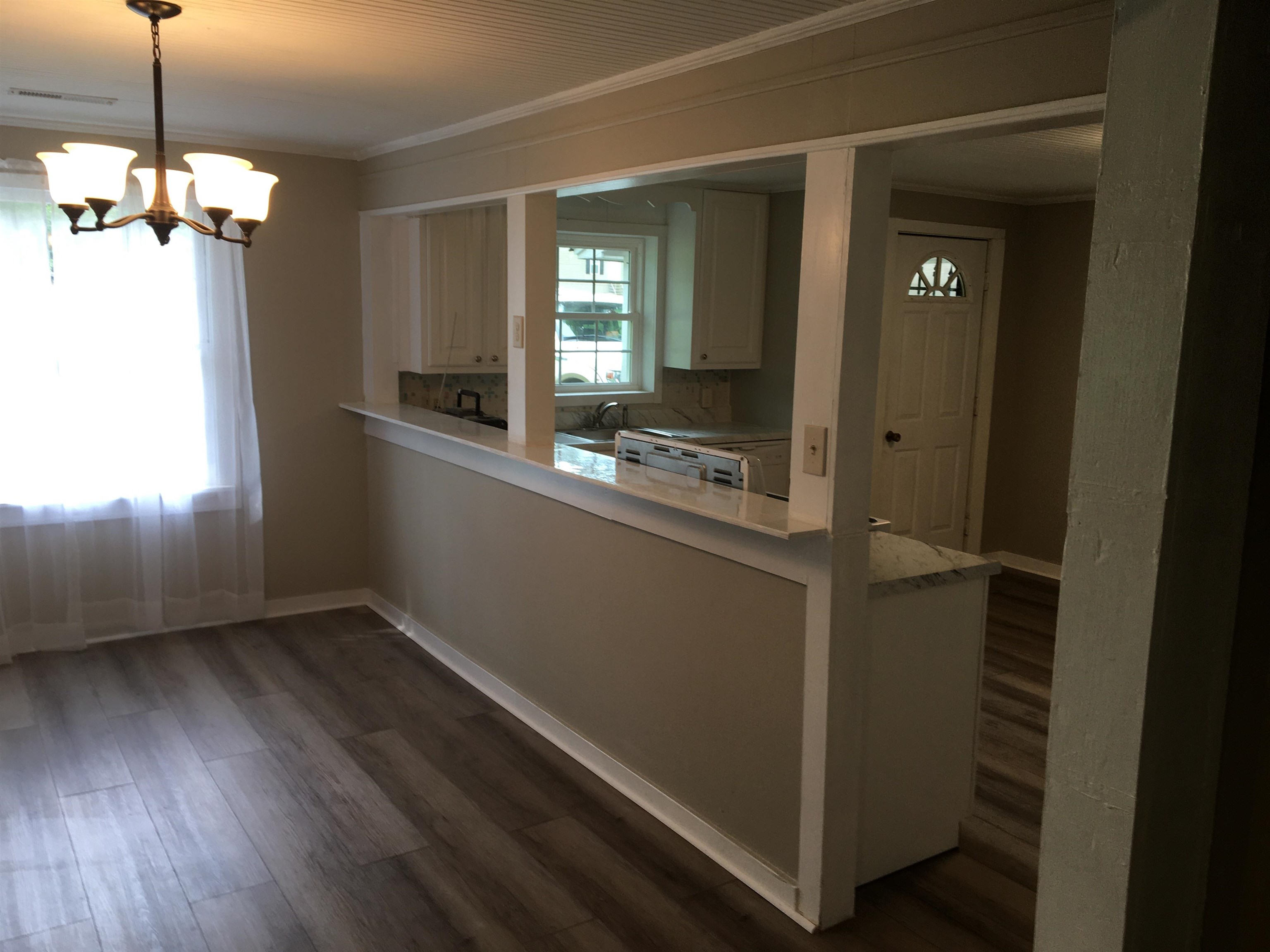 855 Highway 22 Shiloh, TN 38376 - Photo 8 of 24 a room with window and wooden floor
