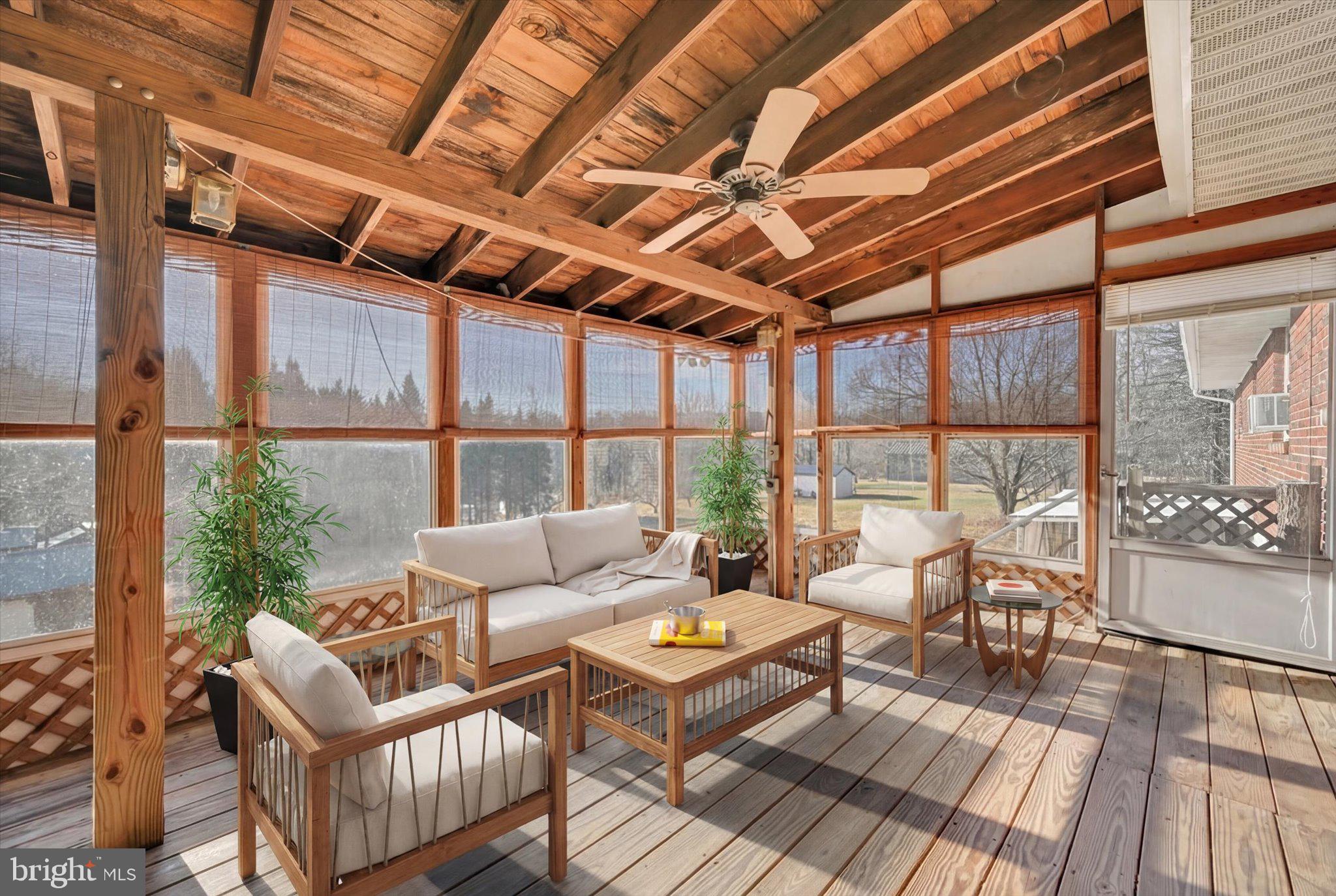 3137 East Galen Hall Road Reinholds, PA 17569 - Photo 19 of 38 Virtually Staged Screened Deck Area