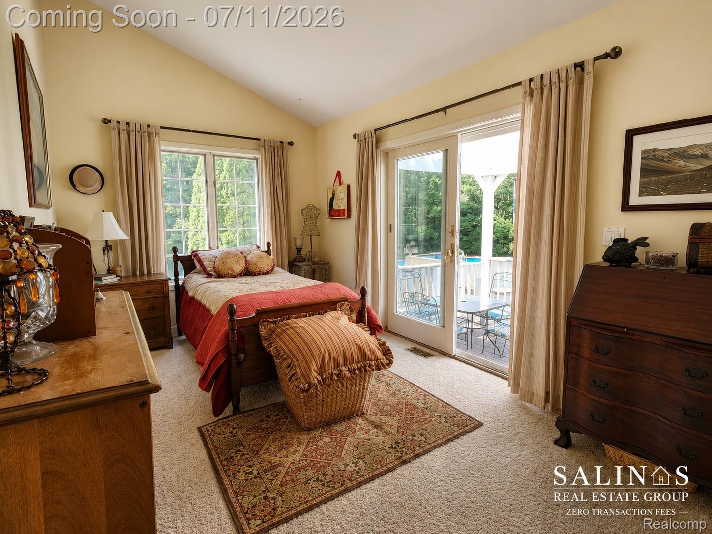 2120 Montague Road Davison, MI 48423 - Photo 23 of 37 Bedroom featuring vaulted ceilings and plush carpeting