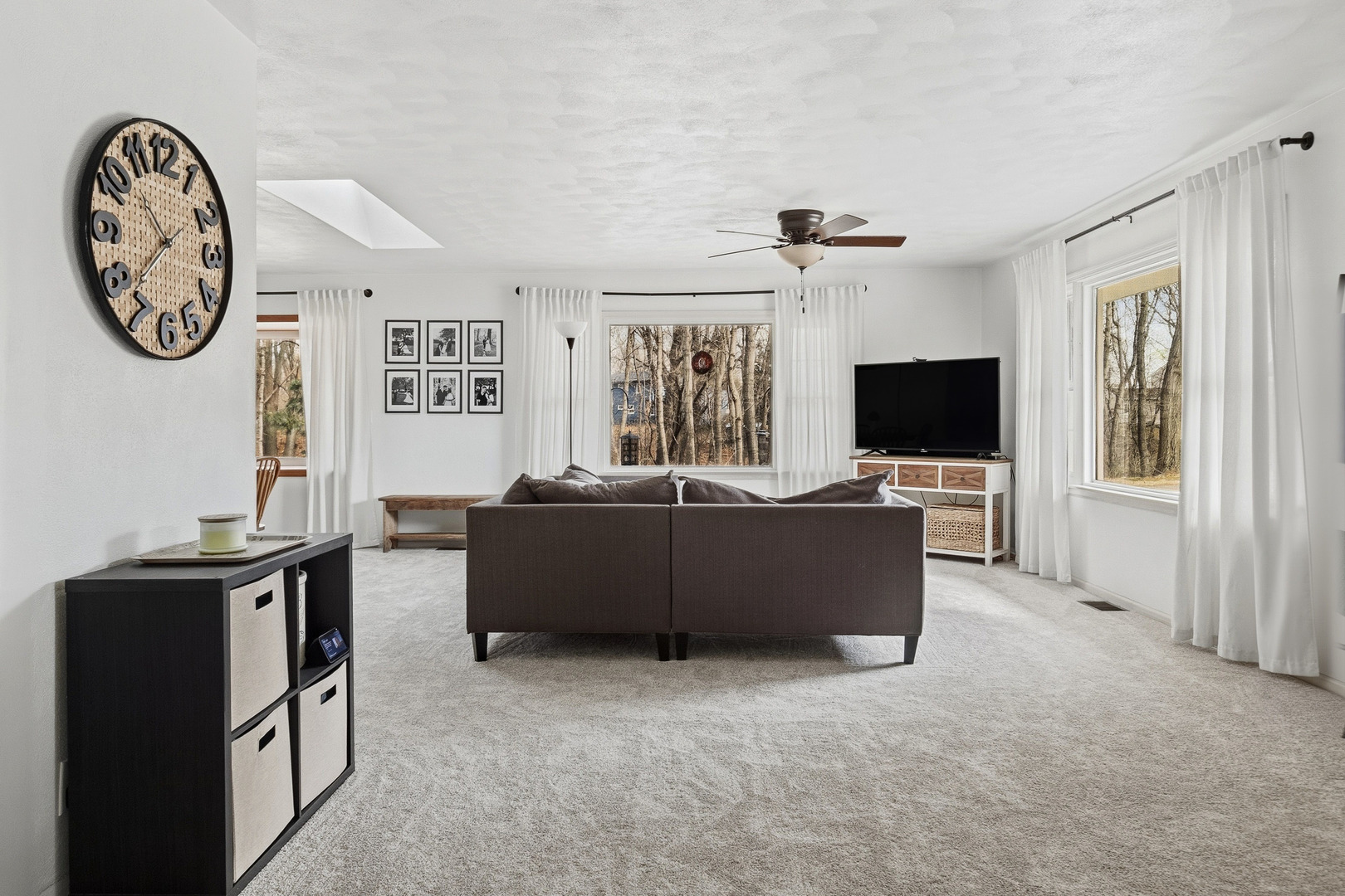 1700 46th Street Moline, IL 61265 - Photo 11 of 45 a living room with furniture and a flat screen tv