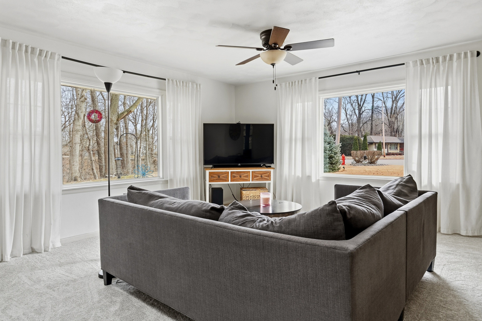1700 46th Street Moline, IL 61265 - Photo 12 of 45 a living room with furniture and a flat screen tv
