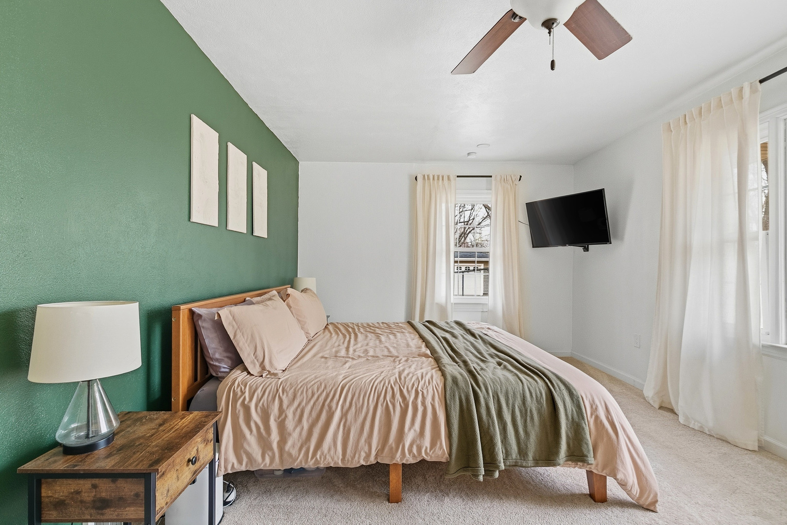 1700 46th Street Moline, IL 61265 - Photo 29 of 45 a bedroom with a bed and a flat screen tv