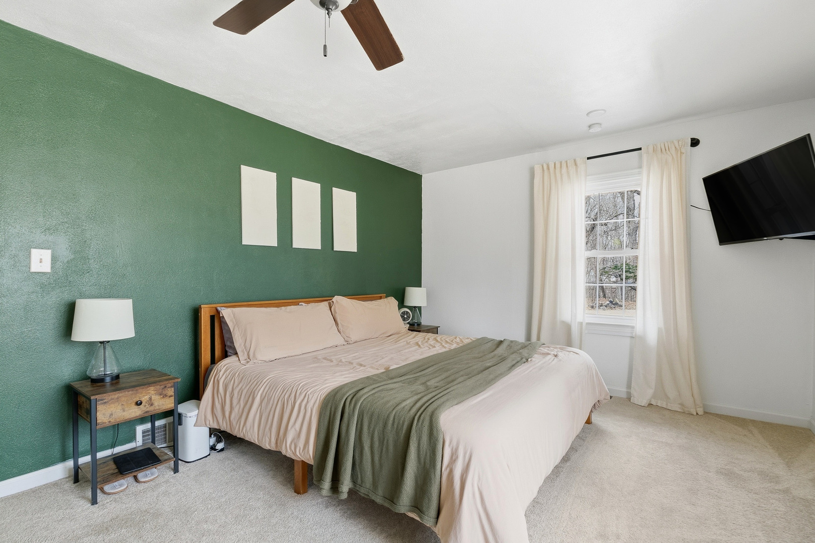 1700 46th Street Moline, IL 61265 - Photo 30 of 45 a bedroom with a bed tv and a window