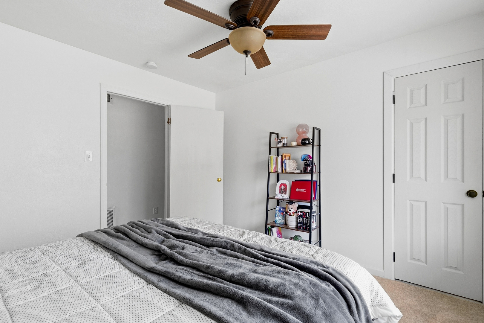 1700 46th Street Moline, IL 61265 - Photo 34 of 45 a bedroom with bed and a chandelier