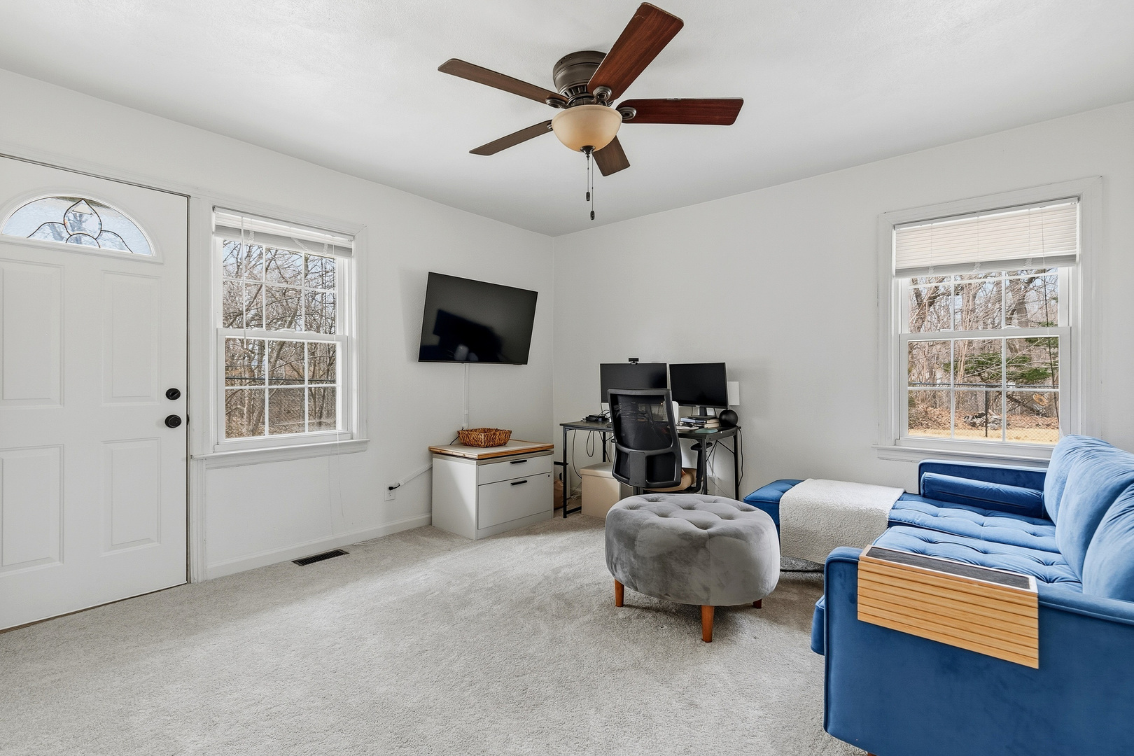 1700 46th Street Moline, IL 61265 - Photo 38 of 45 a living room with furniture and a flat screen tv