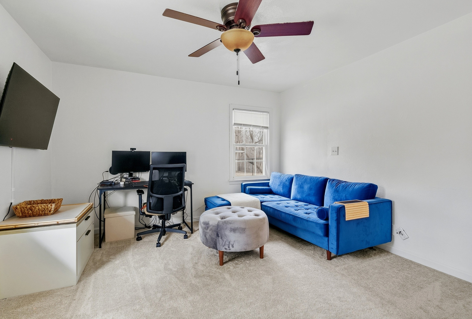 1700 46th Street Moline, IL 61265 - Photo 39 of 45 a living room with furniture and a flat screen tv