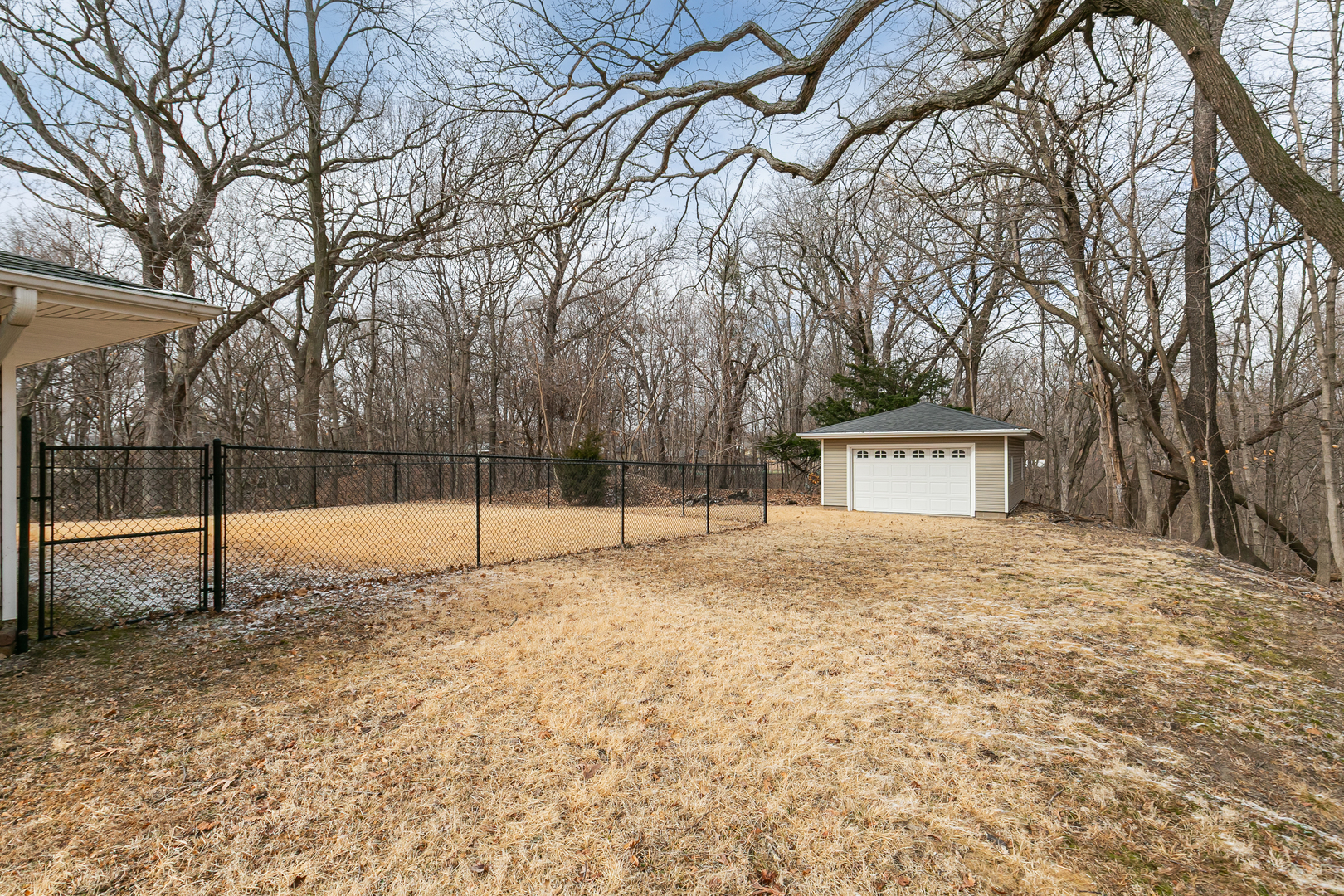 1700 46th Street Moline, IL 61265 - Photo 5 of 45 a house with trees in front of it