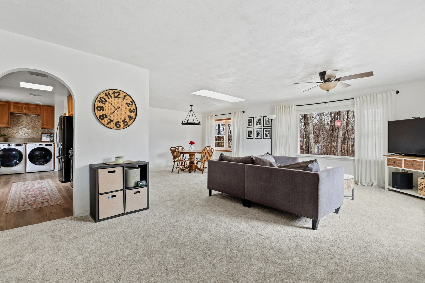 1700 46th Street Moline, IL 61265 - Photo 10 of 45 a living room with furniture and a flat screen tv
