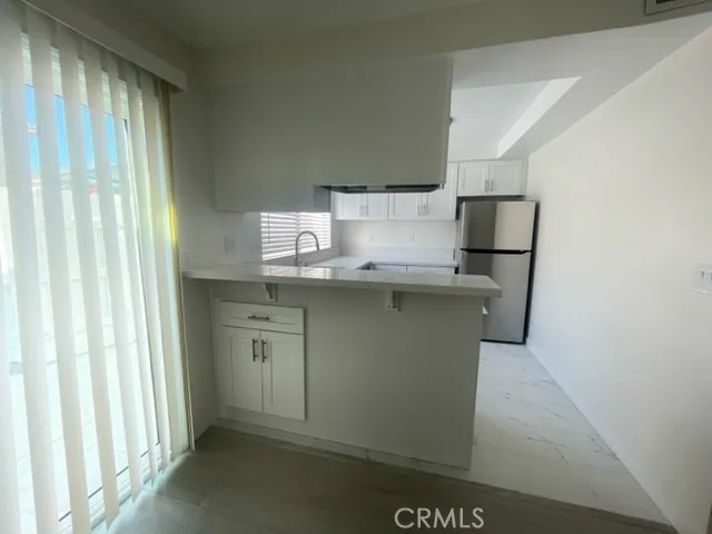 a utility room with washer and dryer