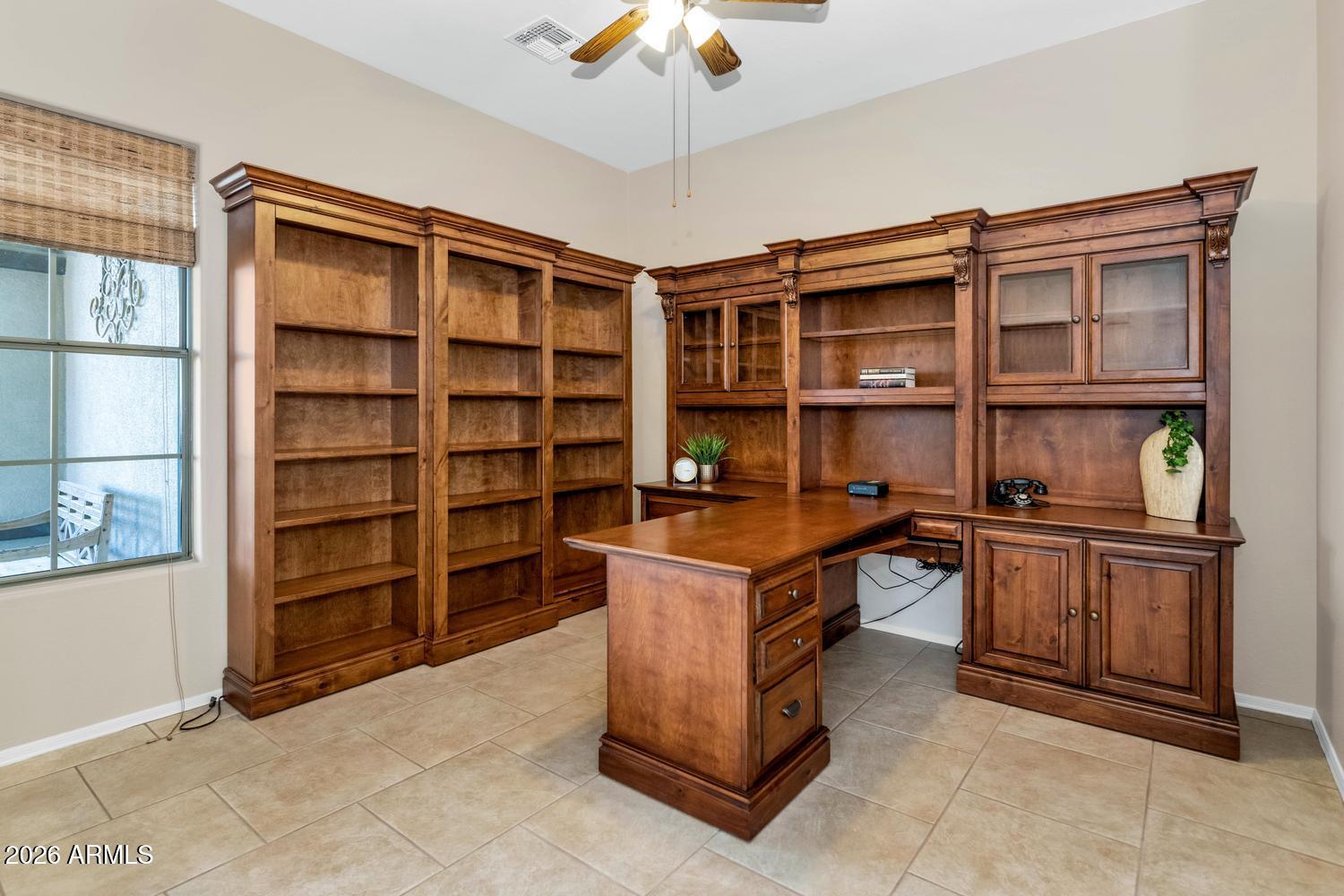 41123 North River Bend Road Phoenix, AZ 85086 - Photo 8 of 45 a view of a center island and cabinets