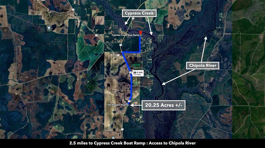 71 South Sr Wewahitchka, FL 32449 - Photo 13 of 31 a street sign on a pole on a street