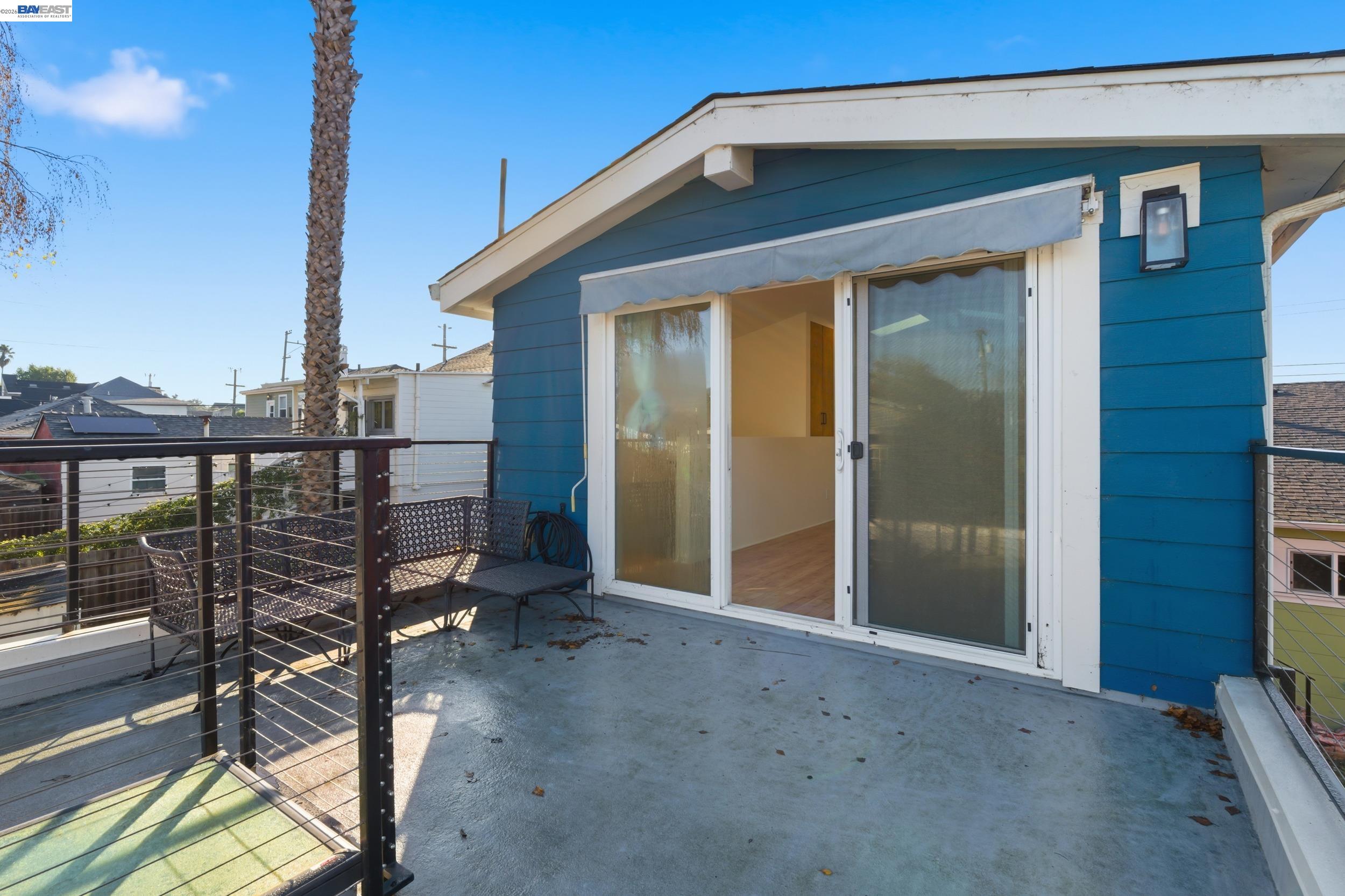 820 46th Street Oakland, CA 94608 - Photo 19 of 34 a view of a balcony with a potted plant