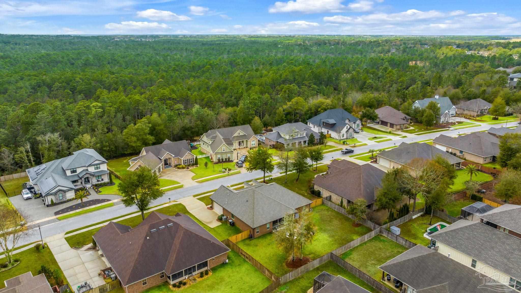 8606 Foxtail Loop Pensacola, FL 32526 - Photo 46 of 57 an aerial view of a house with outdoor space
