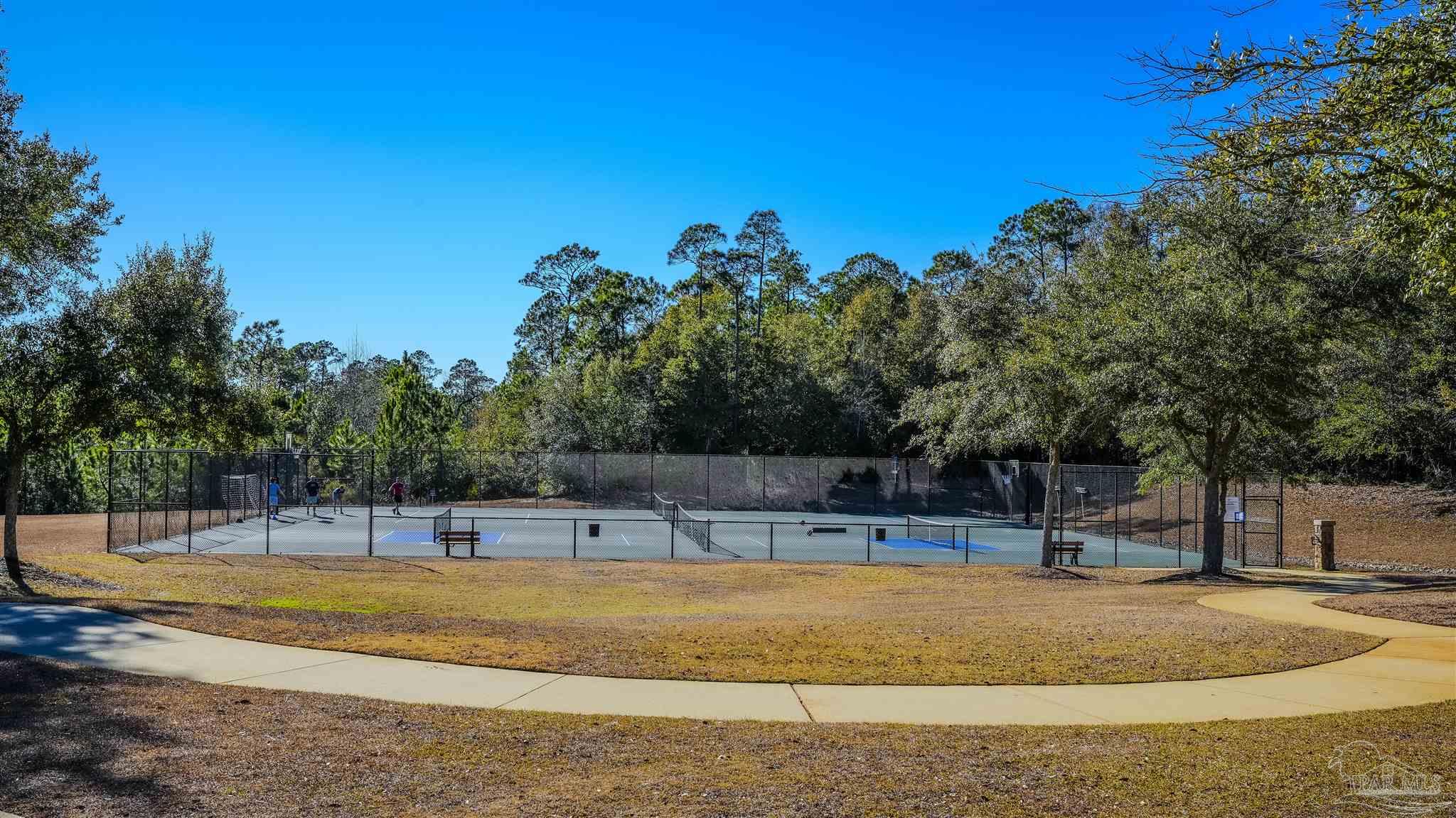 8606 Foxtail Loop Pensacola, FL 32526 - Photo 57 of 57 a view of a swimming pool with an outdoor space