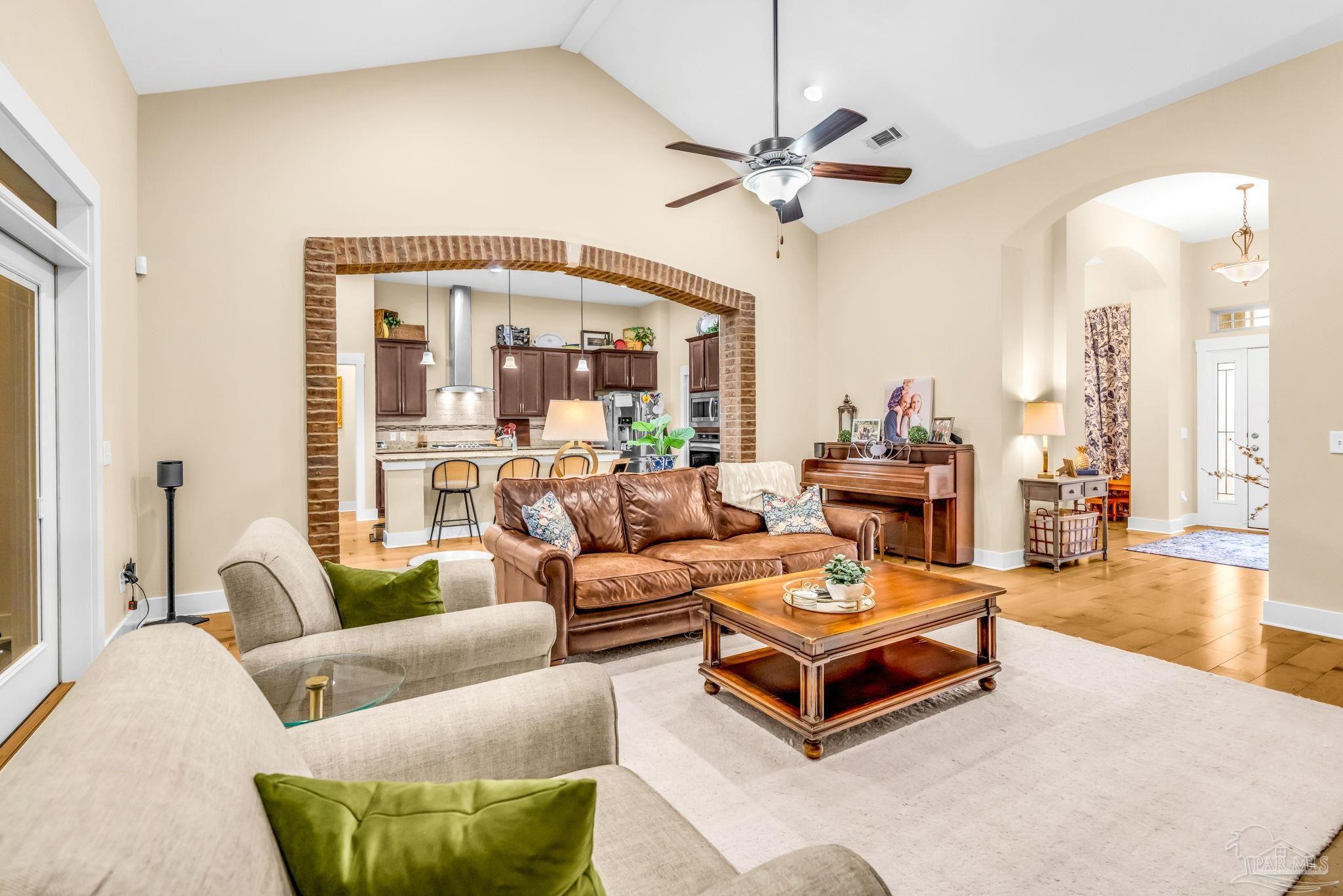 8606 Foxtail Loop Pensacola, FL 32526 - Photo 7 of 57 a living room with furniture and a large window