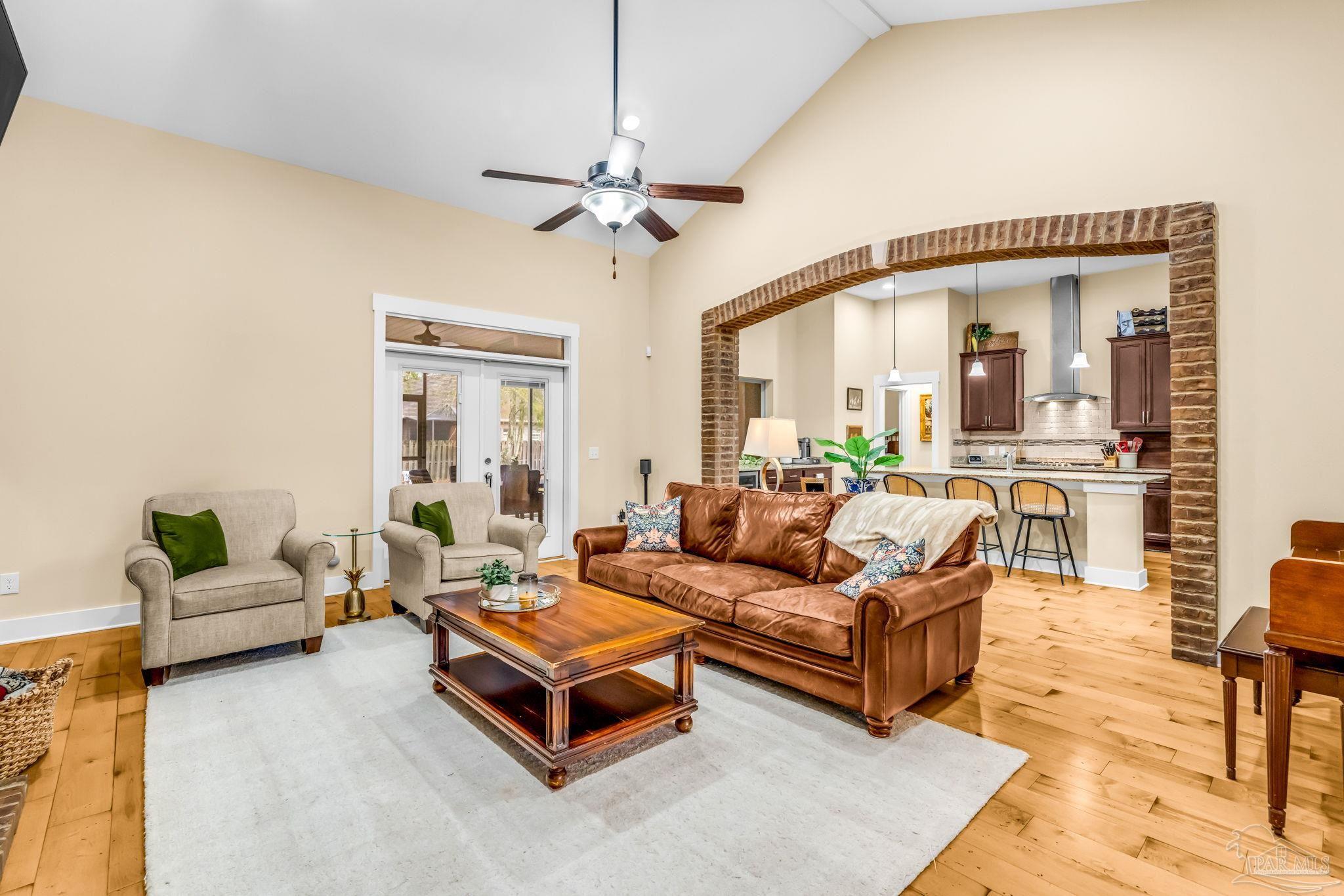 8606 Foxtail Loop Pensacola, FL 32526 - Photo 8 of 57 a living room with furniture and a large window