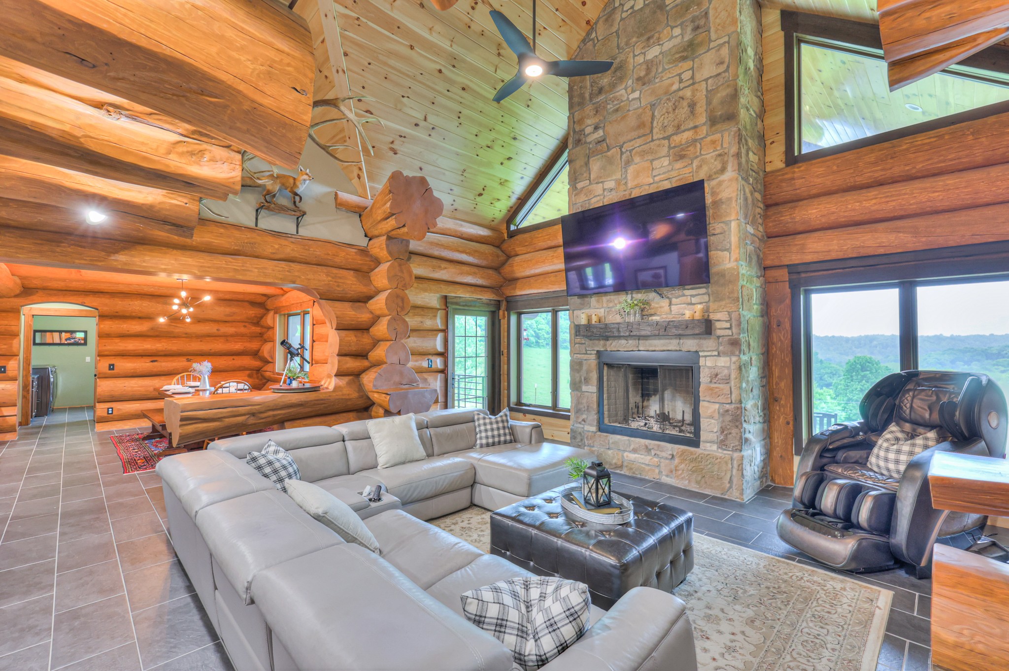 1271 Bivins Road Lewisburg, TN 37091 - Photo 13 of 56 a living room with furniture a fireplace and a ceiling fan